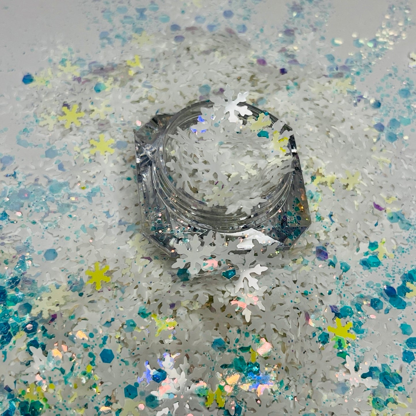 North Pole/White Snowflake Shape Glitter with Yellow and Green Specks image 0